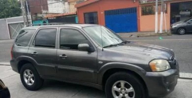 Descargar Manual de Propietario MAZDA Tribute 2006 en PDF Gratis