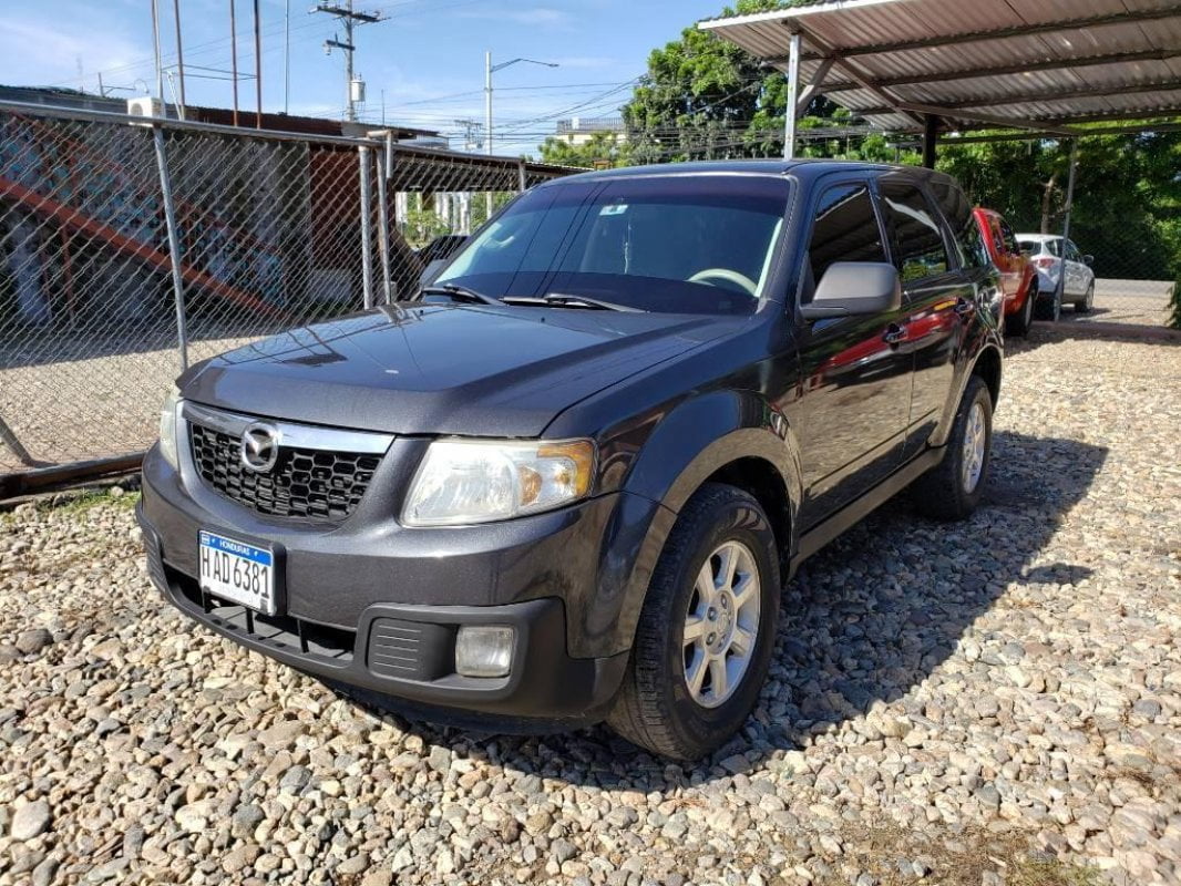 Descargar Manual de Propietario MAZDA Tribute 2010 en PDF Gratis