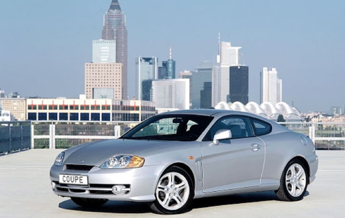 Descargar Manual HYUNDAI COUPE 2004 de Usuario