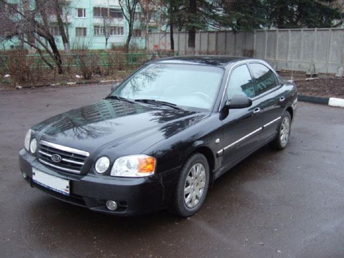 Descargar Manual KIA Magentis 2004 de Usuario