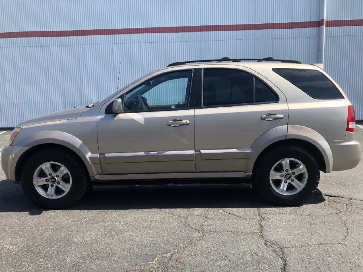 Descargar Manual KIA Sorento 2004 de Usuario