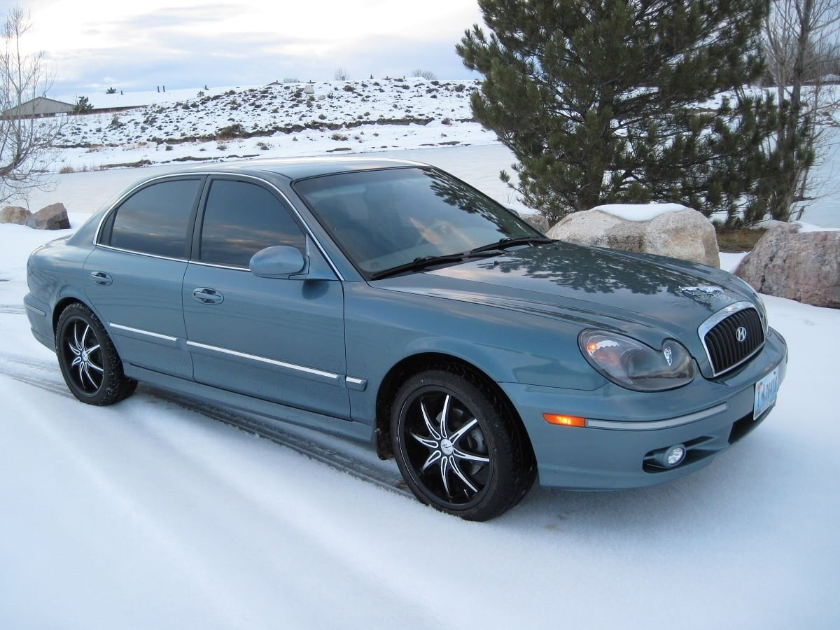 Descargar Manual HYUNDAI AZERA 2005 de Usuario