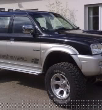 Descargar Manual MITSUBISHI L200 2004 de Usuario PDF Gratis